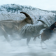 Chris Pratt on a horse riding with dinosaurs against a snowy backdrop.
